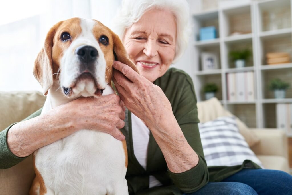 happy-senior-woman-hugging-dog